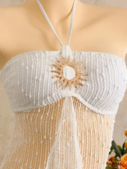 Robe de plage midi dos nu à boutons soleil en maille ajourée transparente
