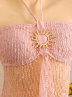 Robe de plage midi dos nu à boutons soleil en maille ajourée transparente