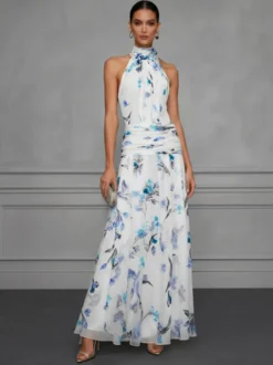 Robe de soirée longue en mousseline de soie à imprimé floral dos nu et taille froncée style licou pour une invitée de mariage