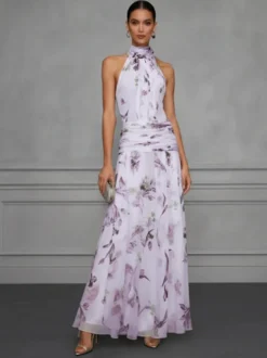 Robe de soirée longue en mousseline de soie à imprimé floral dos nu et taille froncée style licou pour une invitée de mariage