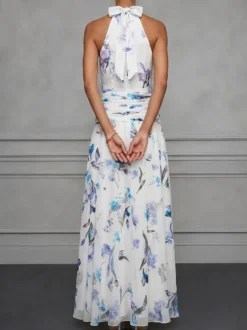 Robe de soirée longue en mousseline de soie à imprimé floral dos nu et taille froncée style licou pour une invitée de mariage