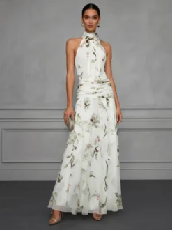 Robe de soirée longue en mousseline de soie à imprimé floral dos nu et taille froncée style licou pour une invitée de mariage