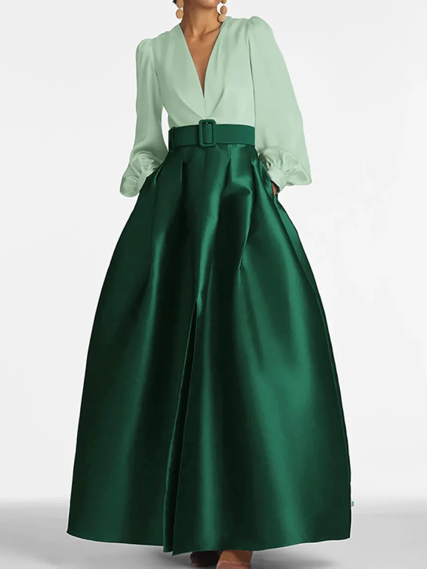 Robe de soirée princesse décolleté en V manches longues fermeture éclair ceinture en satin.