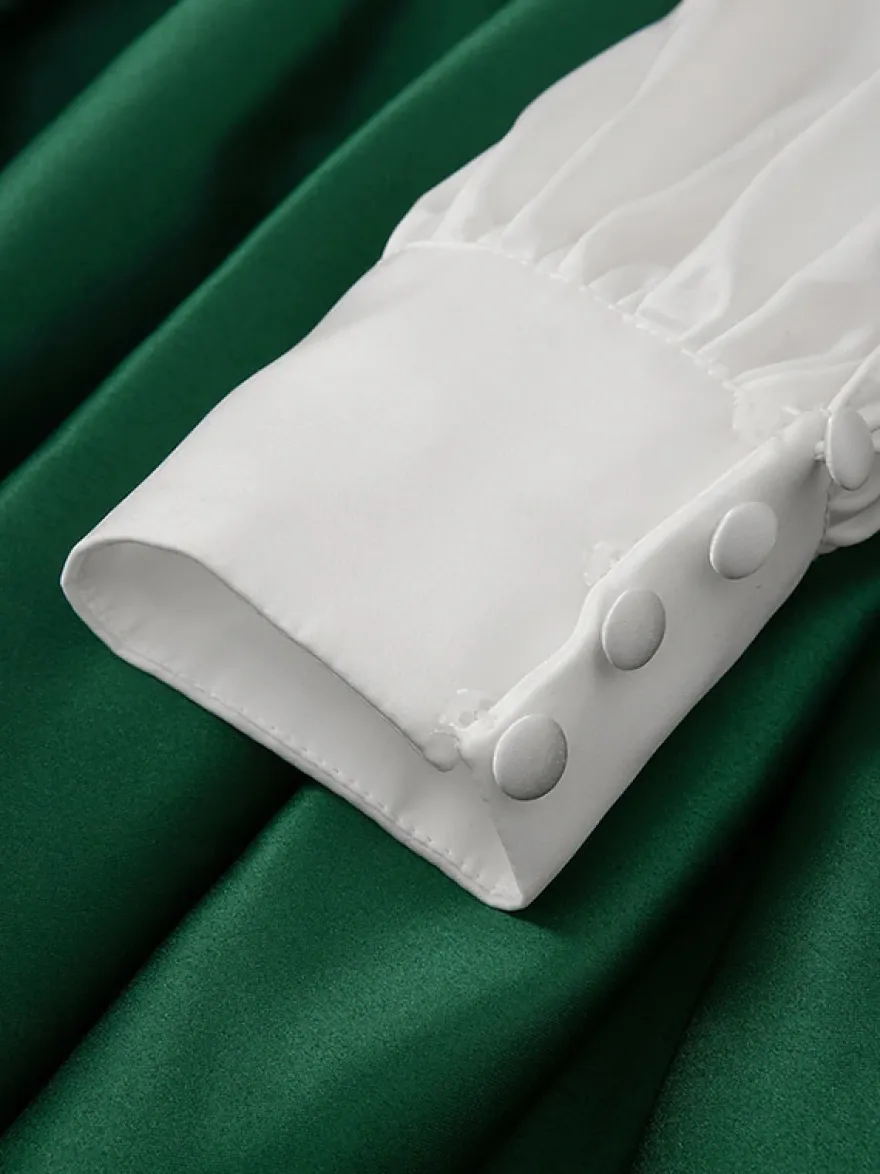 Robe de soirée princesse décolleté en V manches longues fermeture éclair ceinture en satin.