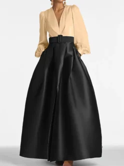 Robe de soirée princesse décolleté en V manches longues fermeture éclair ceinture en satin.