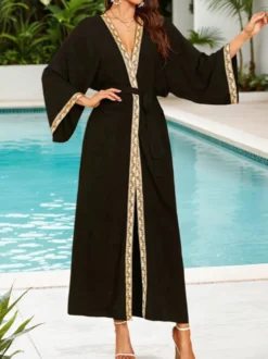 Robe de vacances dorée décontractée à imprimé manches longues et ceinture à volants