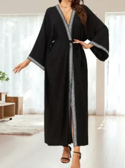 Robe de vacances dorée décontractée à imprimé manches longues et ceinture à volants