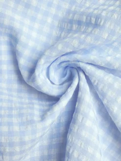 Robe d'été bleue mini à lacets sans manches et dos nu longueur genou idéale pour une soirée en amoureux