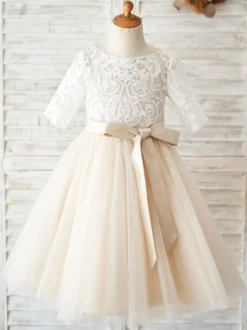 Robe fille de fleur champagne col rond manche courte en dentelle décoré de noeud jupe en tulle bouton sur dos robe cortège enfant