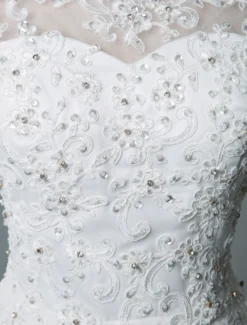 Robe mariée courte col rond en dentelle pailletes jupe en tulle zip sur dos Robe de mariage