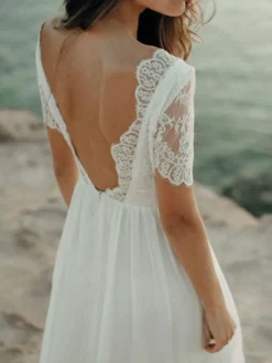 Robe mariée simple col rond manche courte en dentelle longueur au sol en mousseline de soie Robe de mariée à la plage