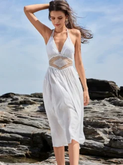 Robe mi-longue blanche cache-cœur à col licou pour la plage d'été 2026