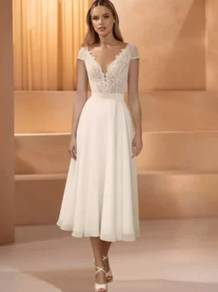 Robes de mariée courtes col bijou manches courtes longueur thé