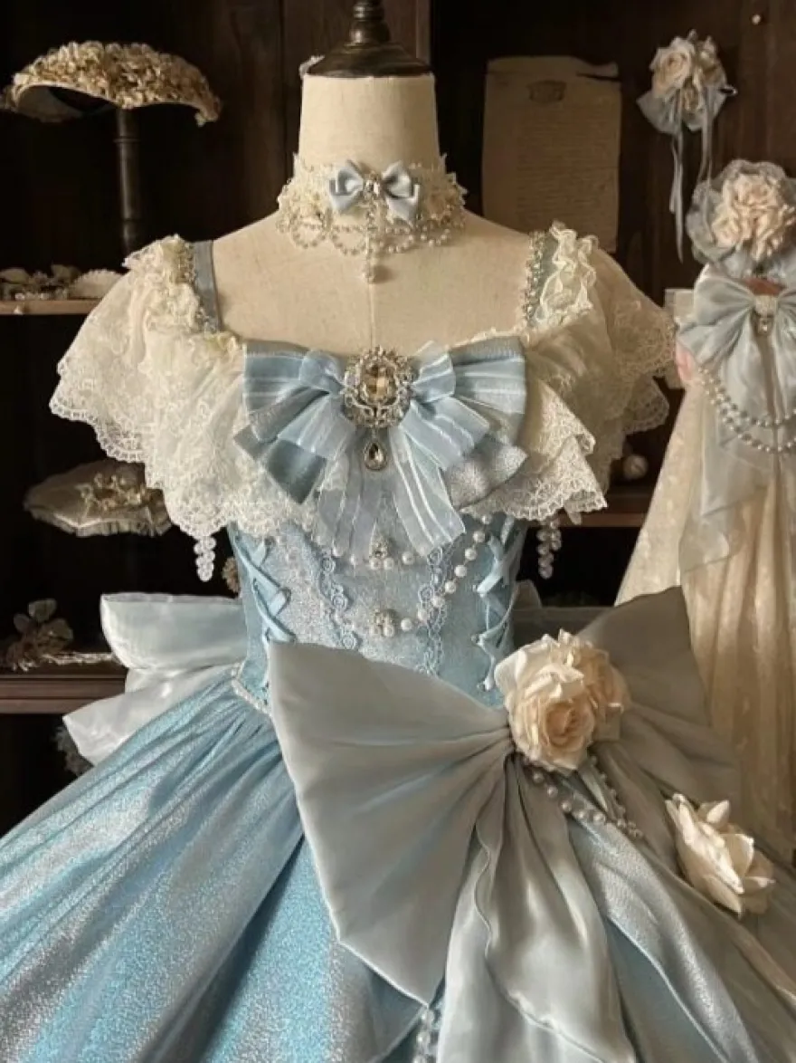 Robes Lolita féeriques bleues à nœuds fleurs et volants longues robes Lolita en dentelle