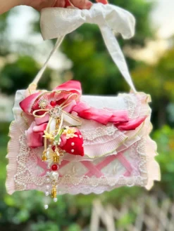 Sac Lolita de style pastoral en polyester rose à volants et chaînes sac à main ombré accessoires Lolita