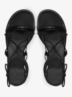 Sandales plates noires à lacets et bout ouvert pour femmes
