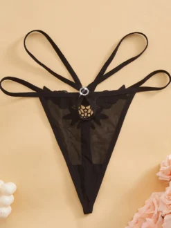 String en dentelle noire lingerie féminine culotte transparente en résille.