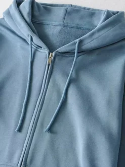 Sweat à capuche zippé à cordon de serrage manches longues coupe ample style décontracté pour femme