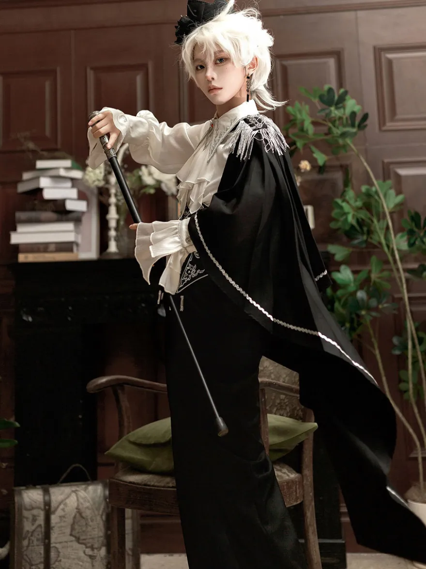 Tenues Ouji Lolita Gothique : cape à manches longues haut blanc ceinture noire et pantalon