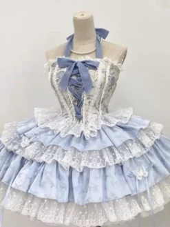 Tenues Sweet Lolita bleu ciel clair à lacets avec nœuds en dentelle et imprimé floral ensemble haut sans manches et jupe