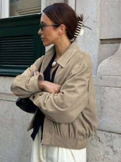 Veste bomber courte décontractée en faux daim pour femme col à revers zippé ourlet côtelé élastique.