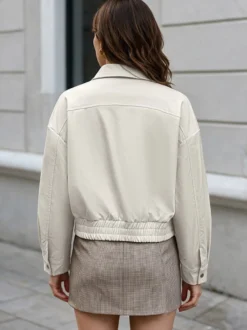 Veste courte à col revers pour femme coupe ample épaules tombantes ourlet élastique fermeture éclair