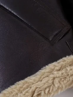 Veste de motard courte doublée en fausse fourrure marron col large et duveteux poignets zippés
