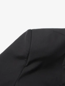 Veste de tailleur cintrée à corset en maille ajourée et dos transparent avec baleines à la taille.